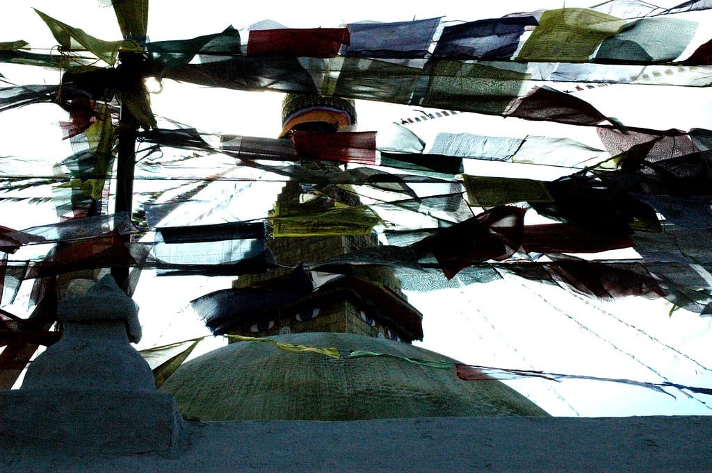 Prayer flags streaming in a strong wind